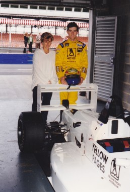 Ann and me with my Yellow Pages livered F3 car at Donington Park in 1997.